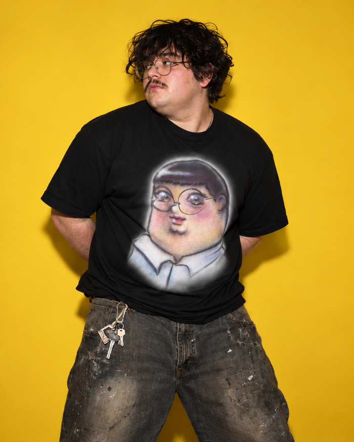 Airbrushed Pretty Peter tee in black, worn in the wild
